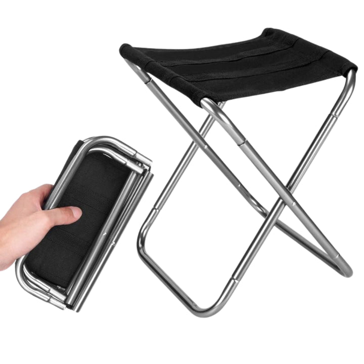 Ihopvikbar campingstol i aluminium med svart sits, uppfälld och hopfälld