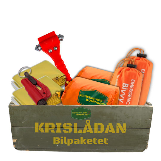 Krislåda bilpaket med glashammare, nödsovsäckar och värmefiltar