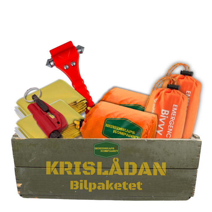 Krislåda bilpaket med glashammare, nödsovsäckar och värmefiltar